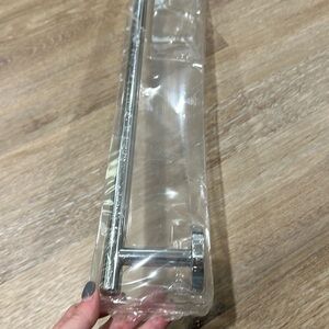NWT silver 27 in long single towel rack 3 in from wall